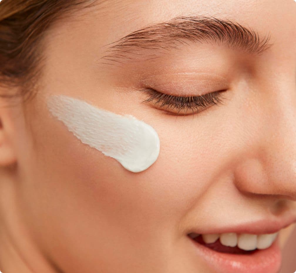 woman with face cream
